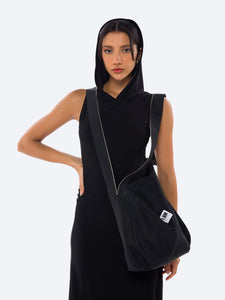 Women Model carrying I AM Zipper Nylon Bag, ideal for day and night outings