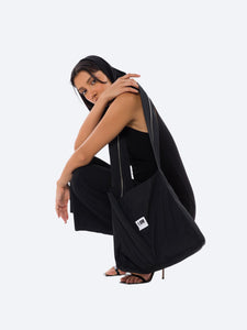 Women Model carrying I AM Zipper Nylon Bag, ideal for day and night outings