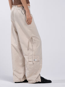 SIGNATURE ZIPPER TROUSERS - NUDE